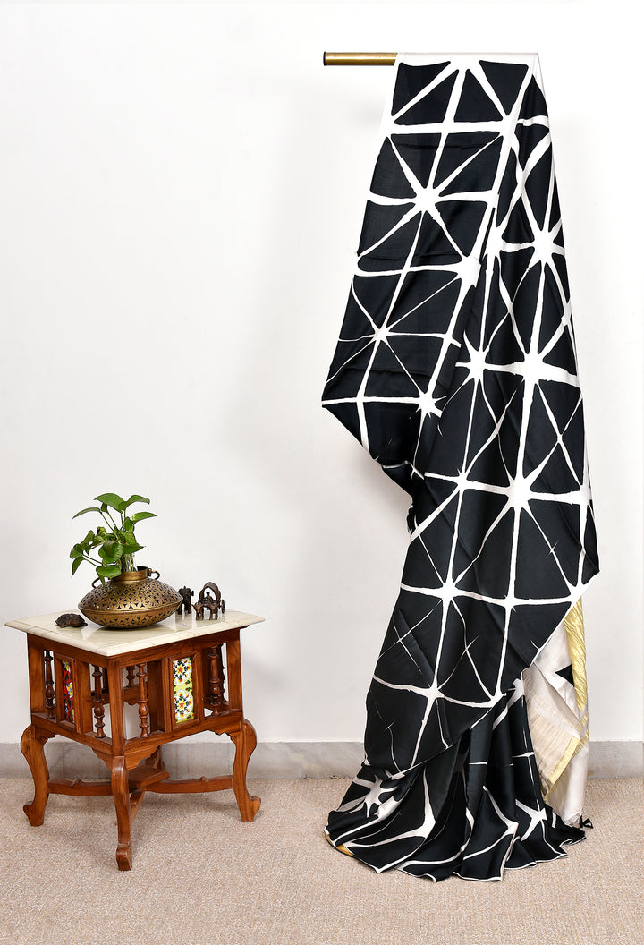 PUNYA  : HANDMADE CLAMP DYED MODAL SILK SAREE WITH TISSUE PALLU