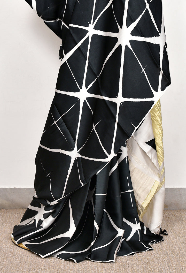 PUNYA  : HANDMADE CLAMP DYED MODAL SILK SAREE WITH TISSUE PALLU