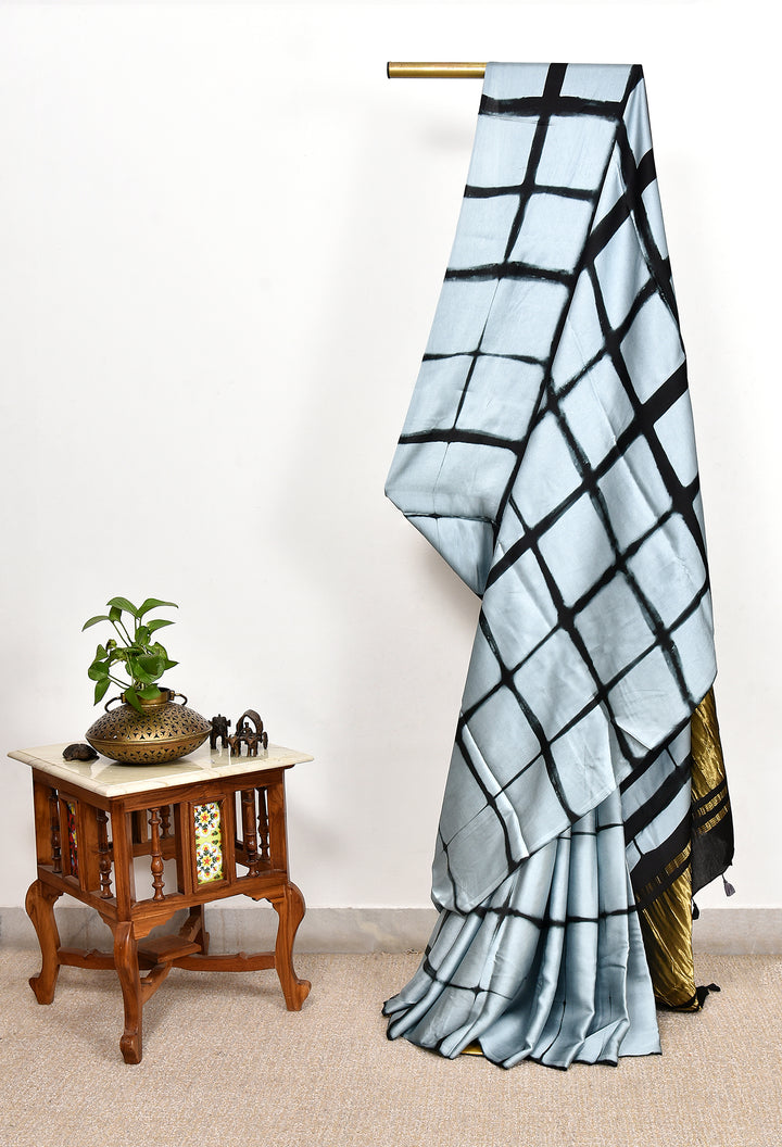 JAYANTI : HANDMADE CLAMP DYED MODAL SILK SAREE WITH TISSUE PALLU