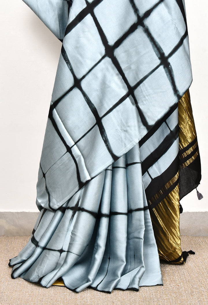 JAYANTI : HANDMADE CLAMP DYED MODAL SILK SAREE WITH TISSUE PALLU