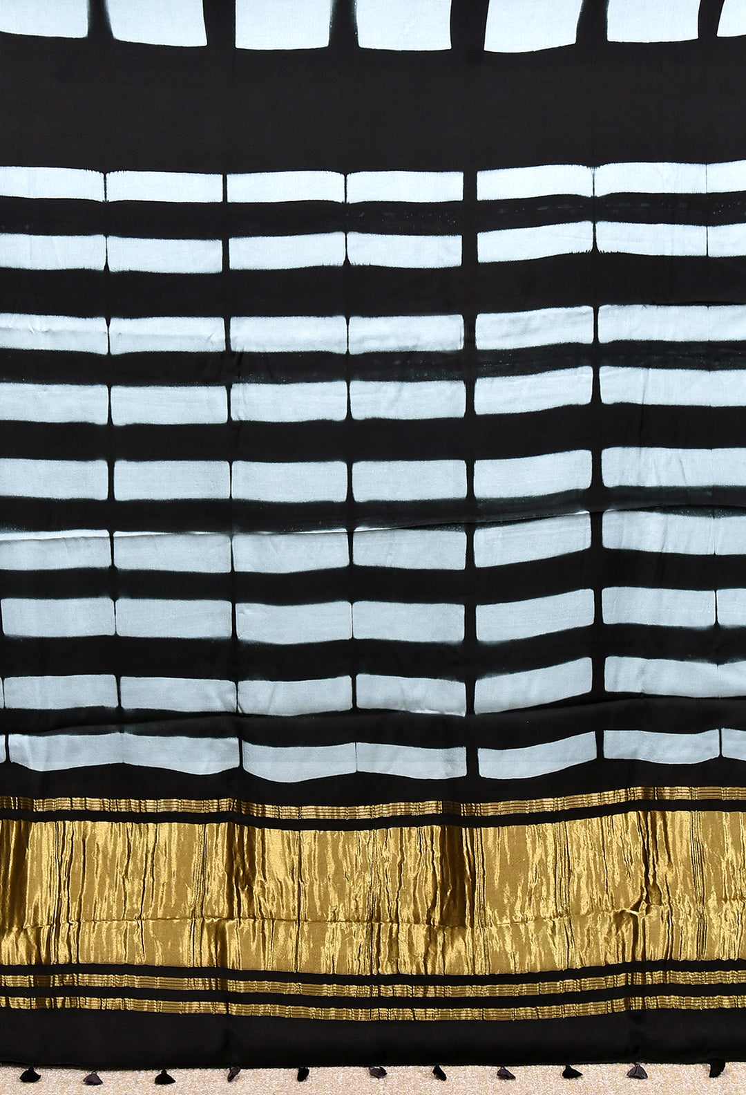 JAYANTI : HANDMADE CLAMP DYED MODAL SILK SAREE WITH TISSUE PALLU
