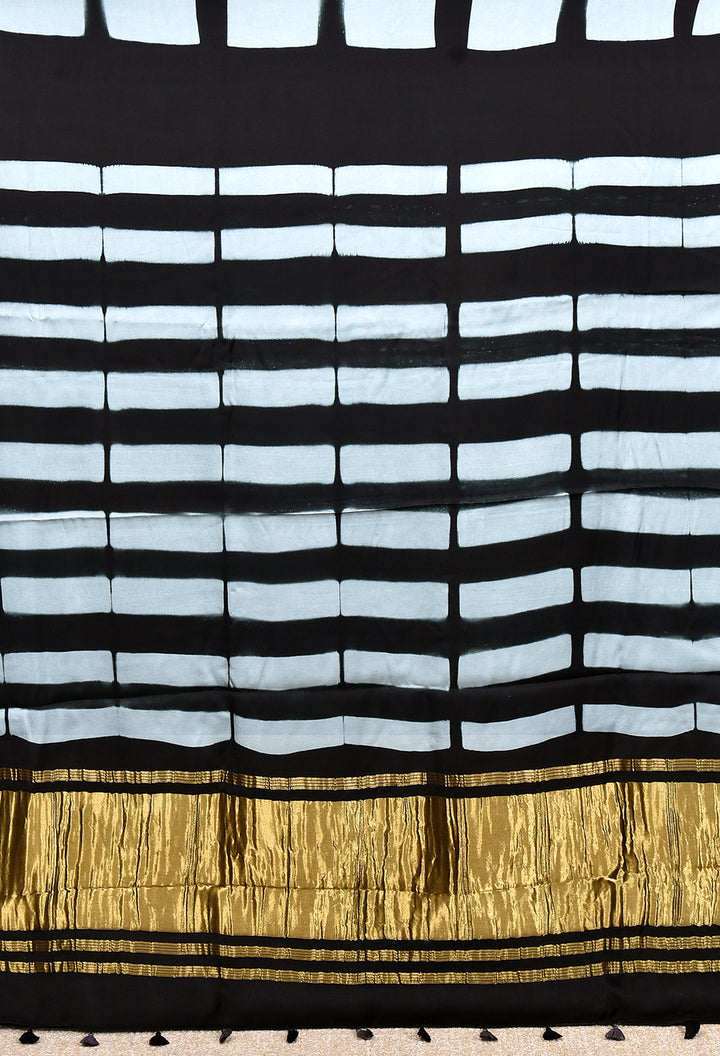 JAYANTI : HANDMADE CLAMP DYED MODAL SILK SAREE WITH TISSUE PALLU