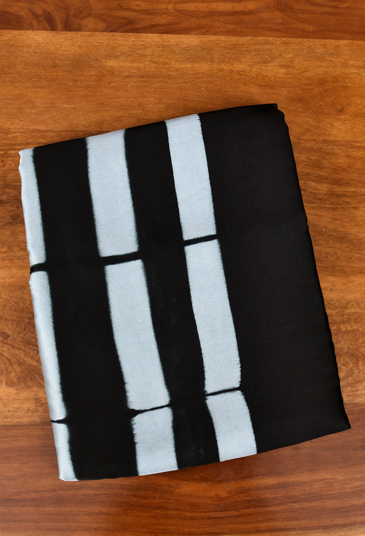 JAYANTI : HANDMADE CLAMP DYED MODAL SILK SAREE WITH TISSUE PALLU
