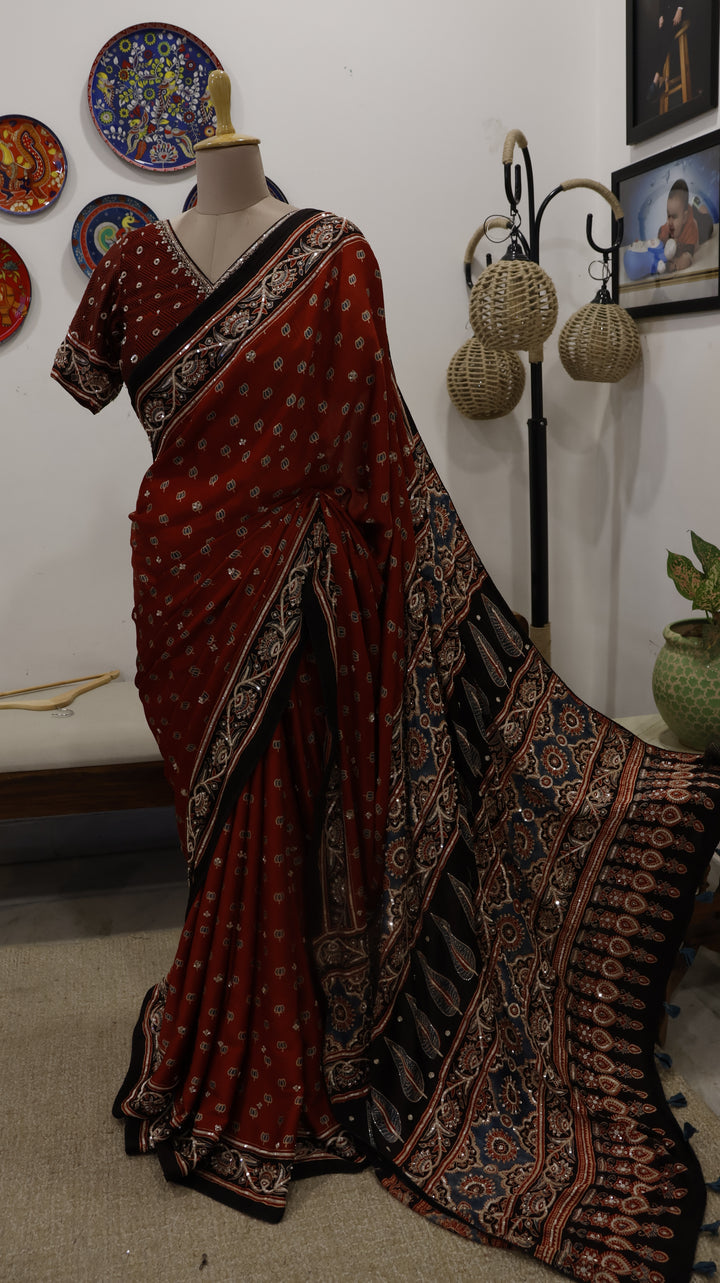RIDDHIKA : AJRAKH HANDBLOCK MODAL SILK SAREE WITH HEAVY HAND EMBROIDERY